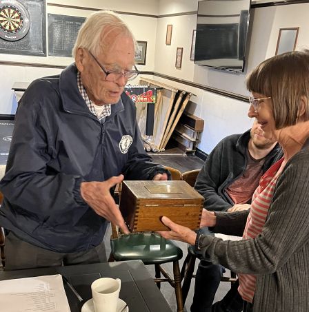 Julie presents Eric with the Sydney Willetts trophy