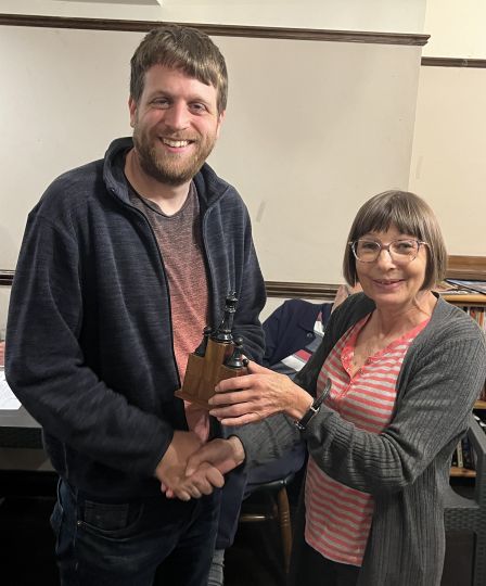 Julie presents Adam with the Dennis Fernihough trophy